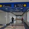 dubai train station hallway with signage