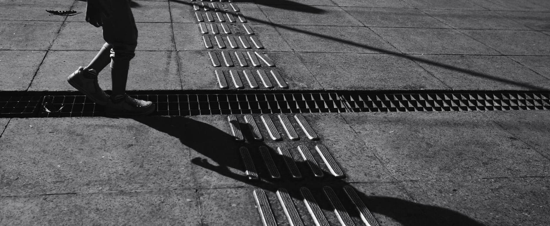 sunlit pavement in black and white