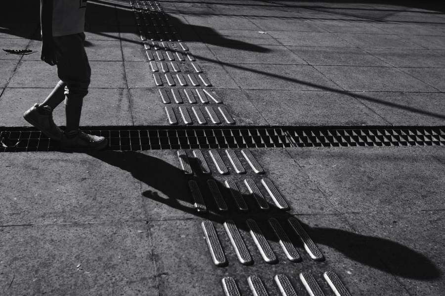 sunlit pavement in black and white
